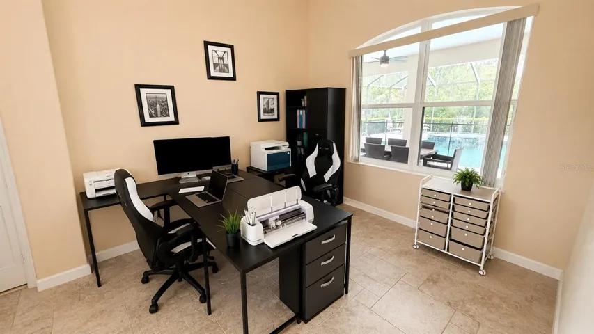 Living room currently being used as office