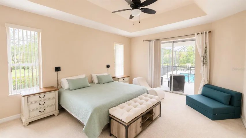 Primary bedroom with access to pool