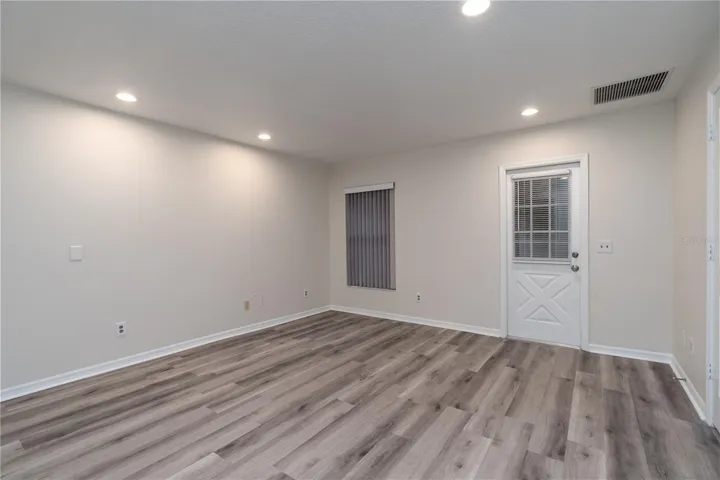 Primary Suite access to Screened Patio