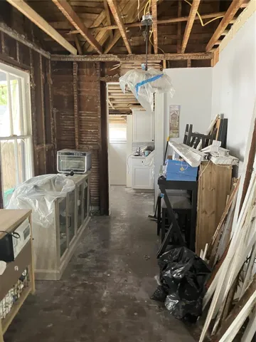 Dining area leads to kitchen and laundry room.