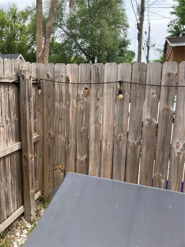 Fencing between property and rear neighbor recently replaced.