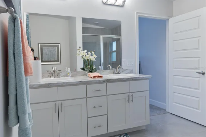 One or more photos may be virtually staged. Actual home shown; finishes, colors, and features may vary.