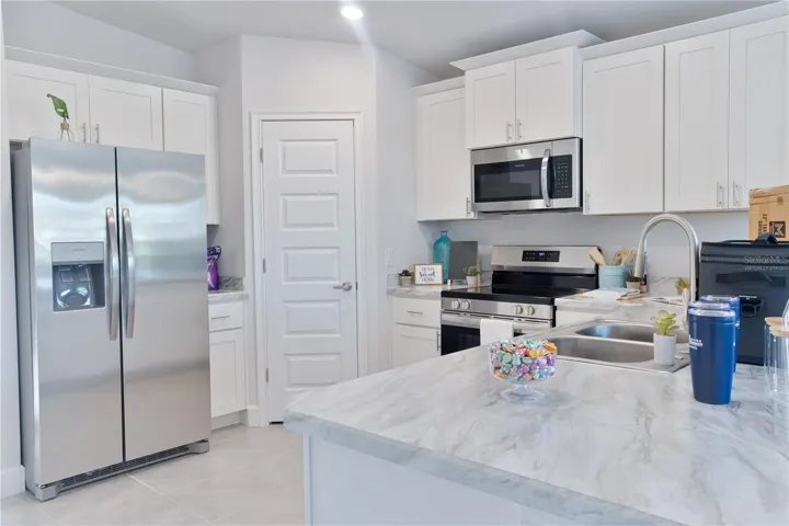 One or more photos may be virtually staged. Actual home shown; finishes, colors, and features may vary.