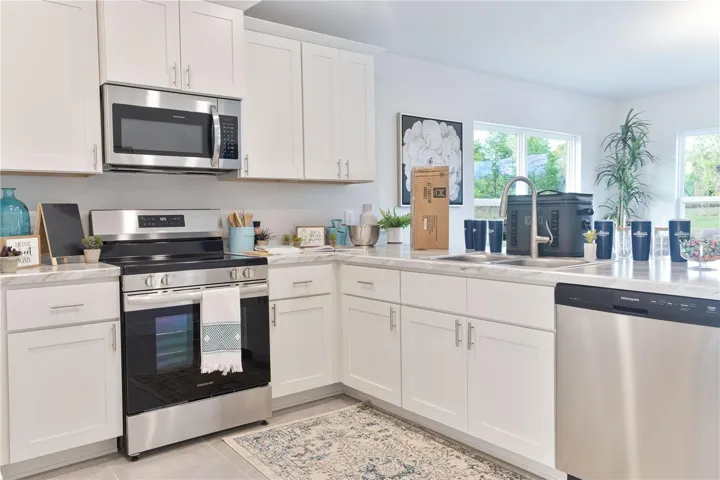 One or more photos may be virtually staged. Actual home shown; finishes, colors, and features may vary.