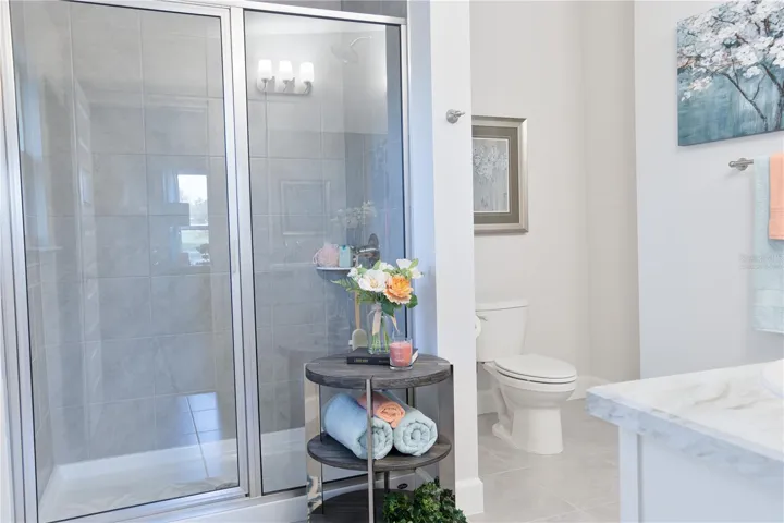 One or more photos may be virtually staged. Actual home shown; finishes, colors, and features may vary.