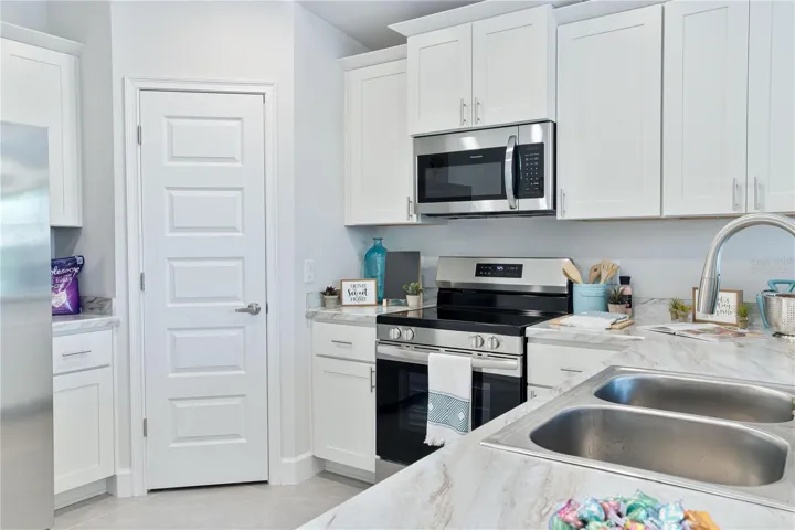 One or more photos may be virtually staged. Actual home shown; finishes, colors, and features may vary.