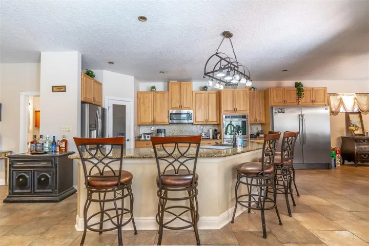 Amazing kitchen with two refrigerators! Double ovens and large gas cook top!