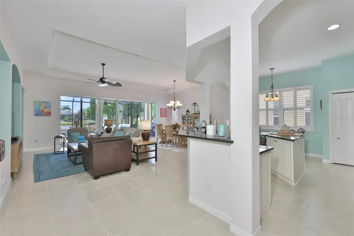 As you walk in, the open floor plan and stunning outdoor scenery, invite you in.