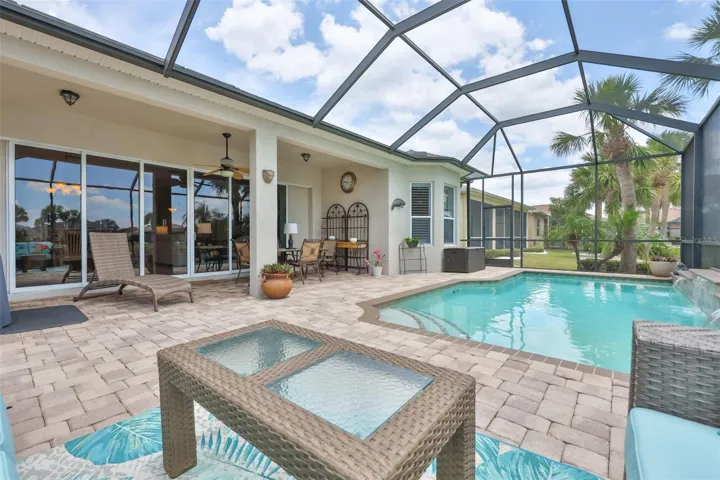 A large beautifully kept deck with six (6) telescoping sliding glass doors that open up the entire space.