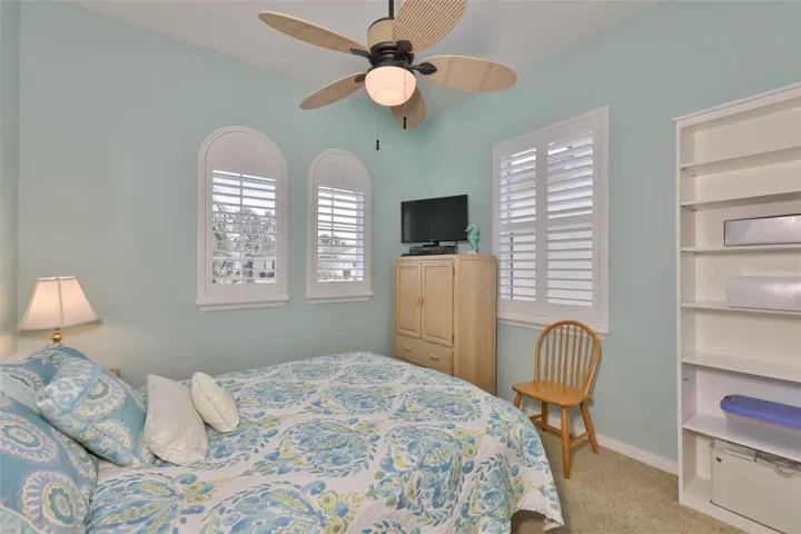 Multiple windows and plantations shutters make any guest feel special.