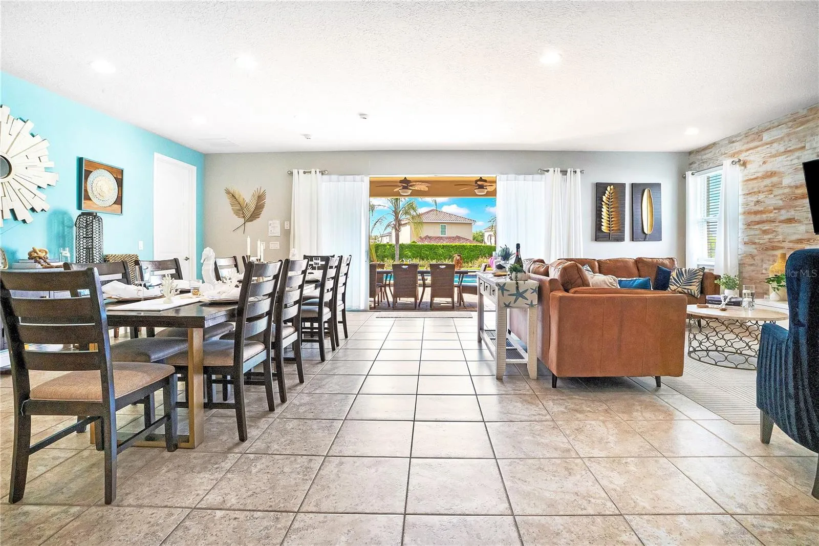 Oversized open-concept gathering space ideal for hosting large groups, celebrations, and for  entertaining