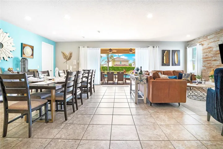 Oversized open-concept gathering space ideal for hosting large groups, celebrations, and for  entertaining