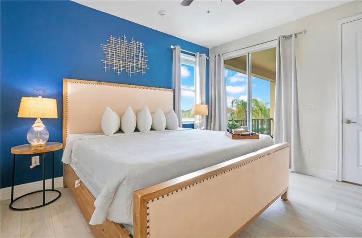 Spacious secondary primary retreat featuring abundant natural light and private balcony access