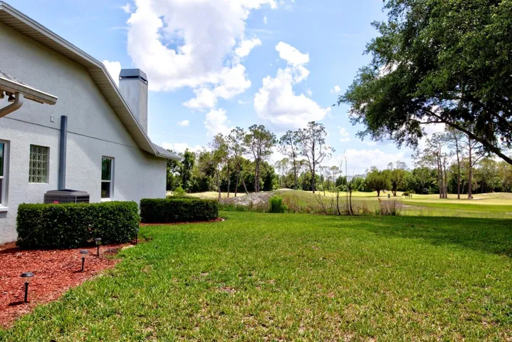 Side yard and view of the golf course.