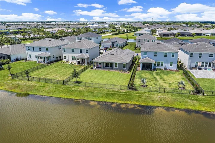 Aerial View Back of House with Fenced Yard
