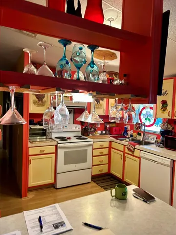 Kitchen From Dining Room Over Eat In Bar