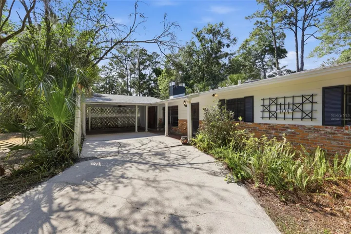 Virtually staged, removed items from carport