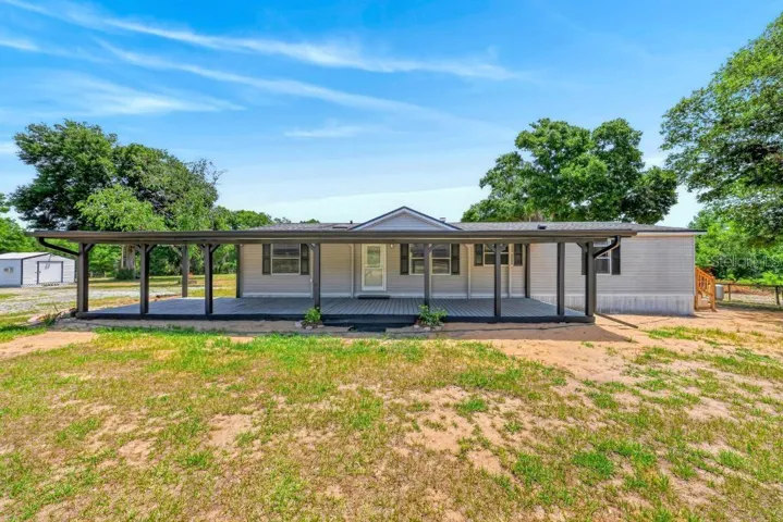 Front of Home with Beautiful 12x48 deck!