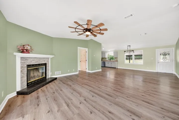 Living Room looking into Dining Room and Kitchen