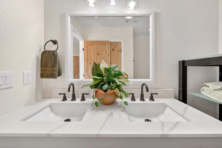 Primary Bath - Double sinks, Double Shower Heads, Linen Closet and towel storage system