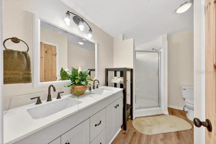 Primary Bath - Double sinks, Double Shower Heads, Linen Closet and towel storage system