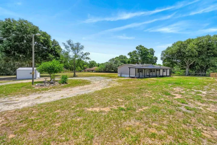 Midway looking at the house and storage shed