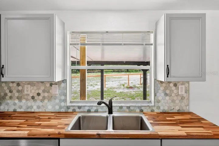 Check those hand waxed Butcher Top Counters! New fixture and New window blinds