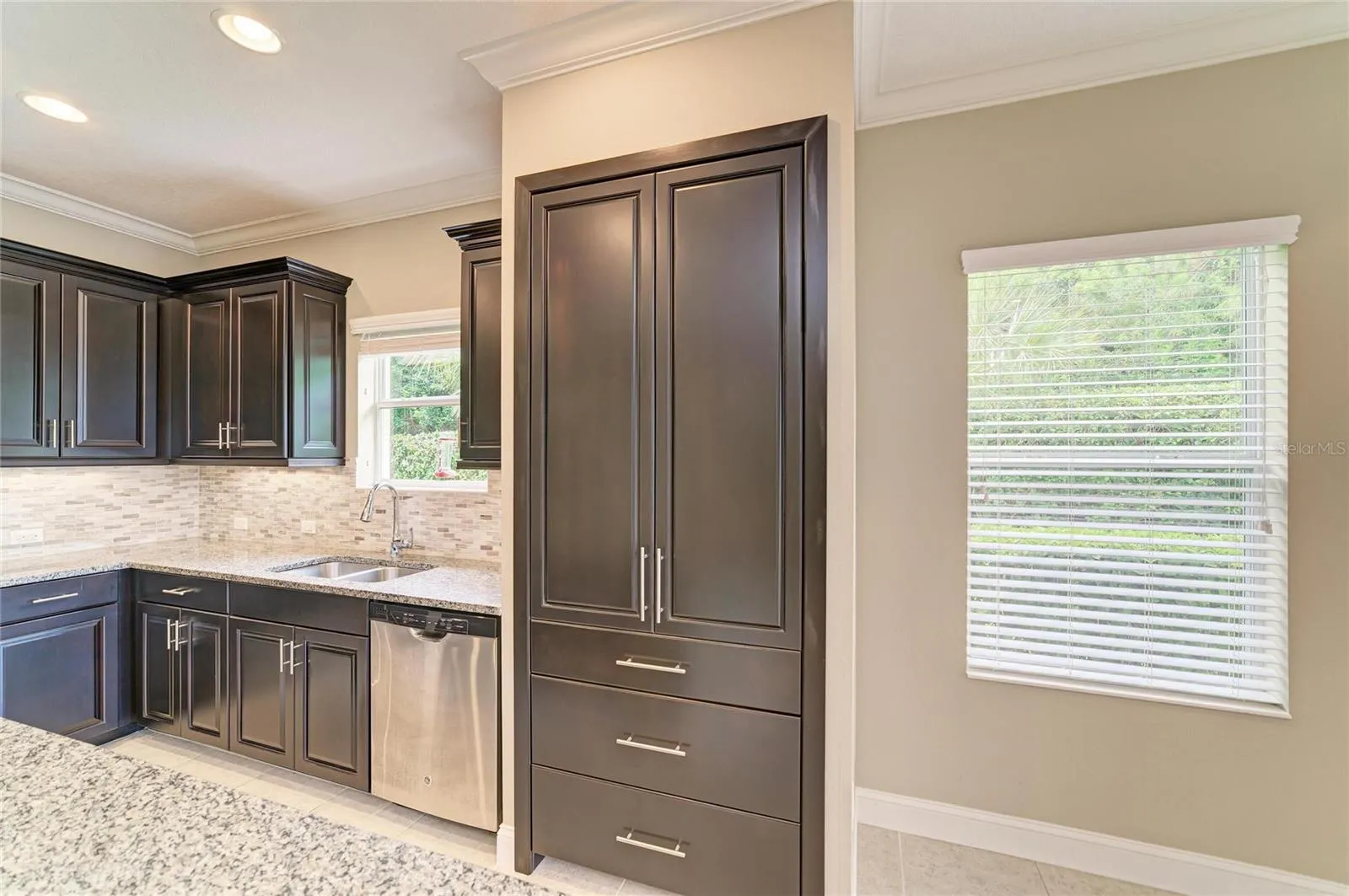 Pantry was converted to match the cabinets.  Pull out shelves and drawers