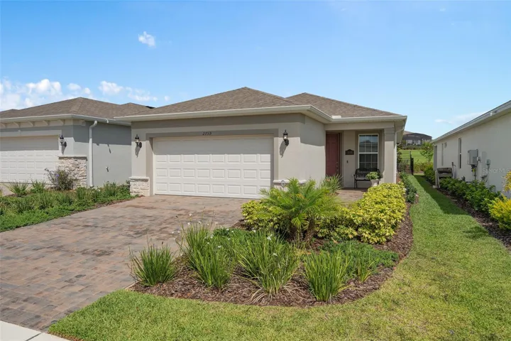 This home offers Great Curb Appeal with the upgraded Stone Accents and a Covered Front Porch