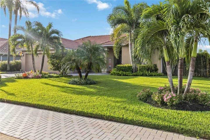 Well-maintained landscaping with flower beds