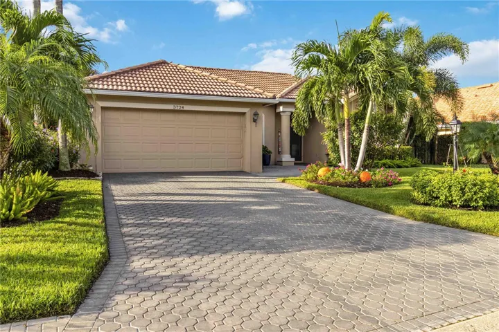 Pavers in the drive-way & two car garage.