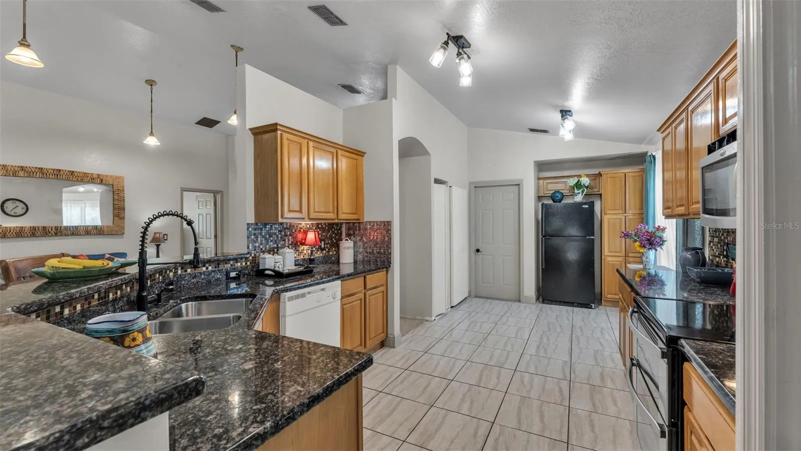 Kitchen, garage straight ahead through door