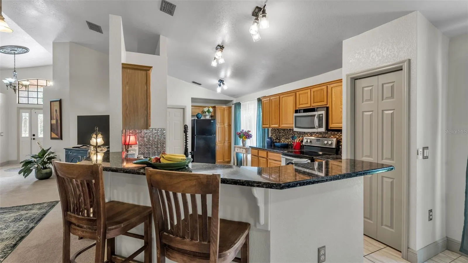 Kitchen from dining room-Granite counter tops