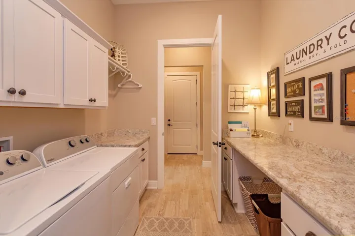 Launrdy Room with Ample Cabinetry and Storage