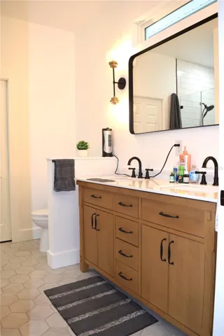 Primary Bathroom with Dual Sinks and a Walk-In Shower