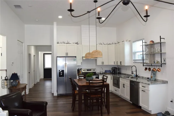 Kitchen features Stainless Appliances, Granite Counters and a Closet Pantry