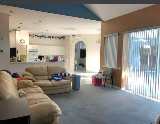 Family Room with views to screened Lanai and Pool