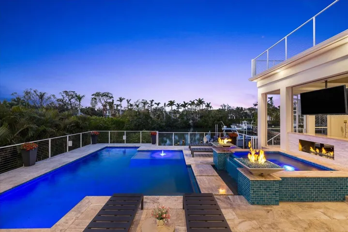 Outdoor Pool & Spa with firebowls (raised to 1st floor living)