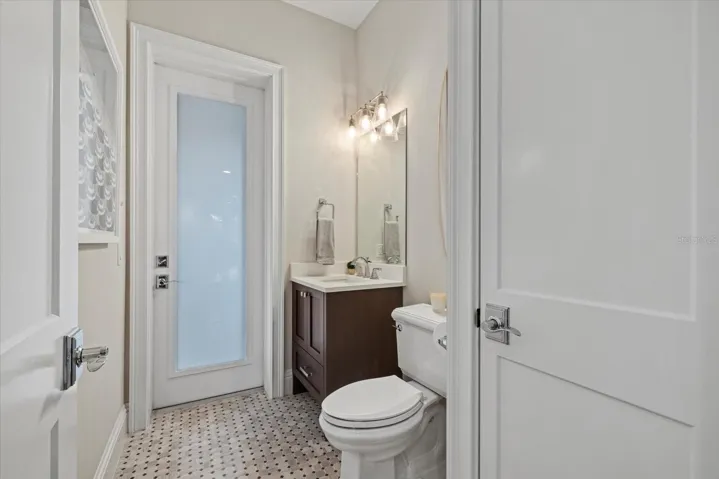 Half bath with access to outdoor living space