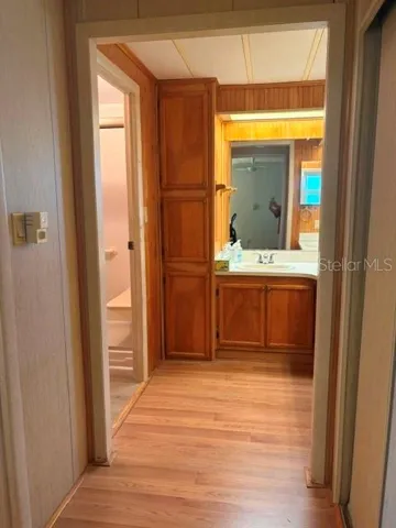 MASTER BATH HALLWAY WITH DOUBLE CLOSETS