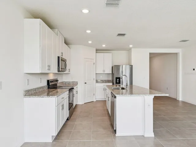 Interior photos are not of the actual home but are photos of the builder home with the same floorplan with similar interior finishes and features.