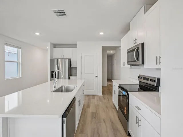 Interior photos are not of the actual home but are photos of the builder home with the same floorplan with similar interior finishes and features.
