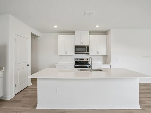 Interior photos are not of the actual home but are photos of the builder home with the same floorplan with similar interior finishes and features.