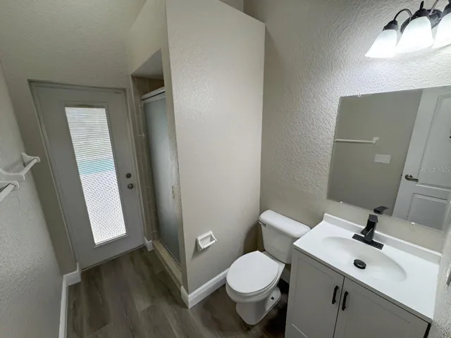 BATH 4 HAS FRENCH DOOR TO POOL AREA, NO NEED TO WALK THROUGH THE HOME WITH WET BATHING SUITS