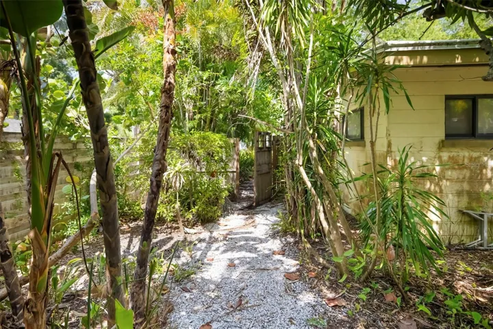Side yard with gated access.