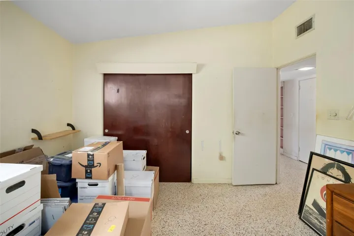Secondary bedroom with build in closet