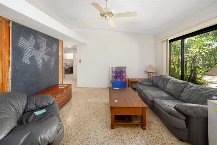 Living room featuring a large window giving the home an abundance of natural light
