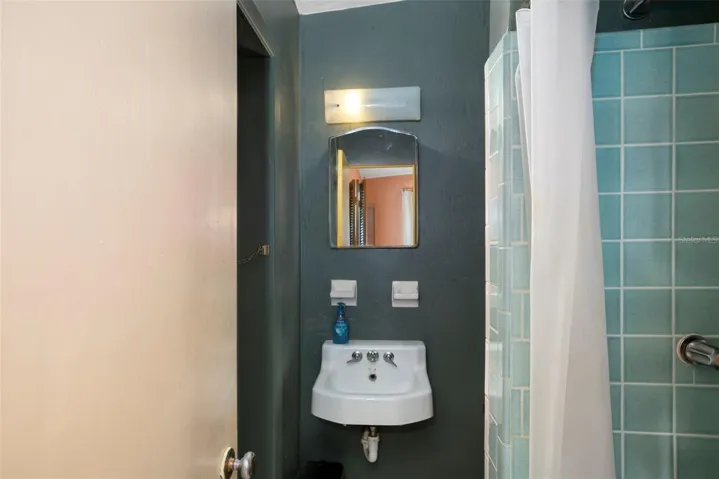 Full bathroom with direct pool access