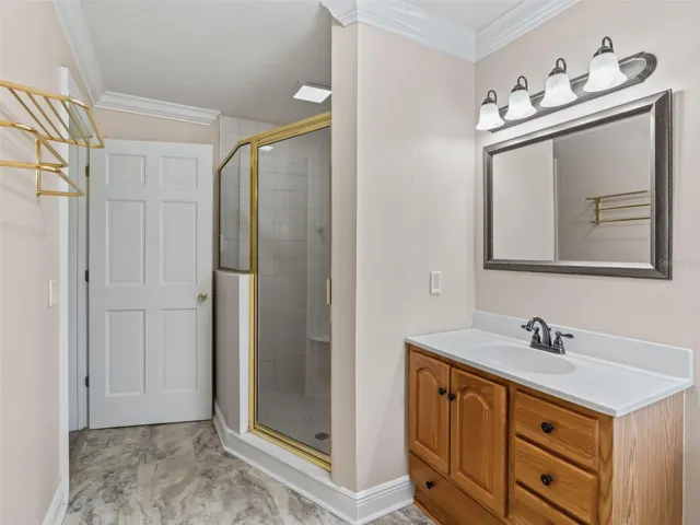private bathroom with outside access door