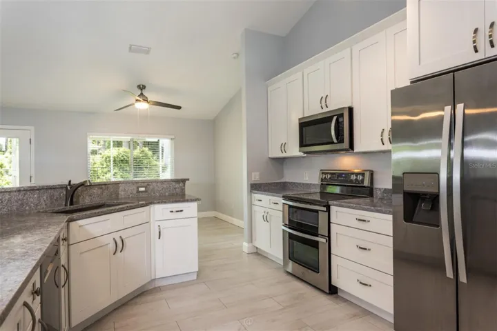 Soft-Close Cabinets & 1 1/4 inch Granite Countertops